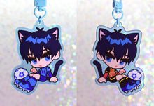 Load image into Gallery viewer, Anime character chibi keychain with navy hair in light blue border with soccer ball.